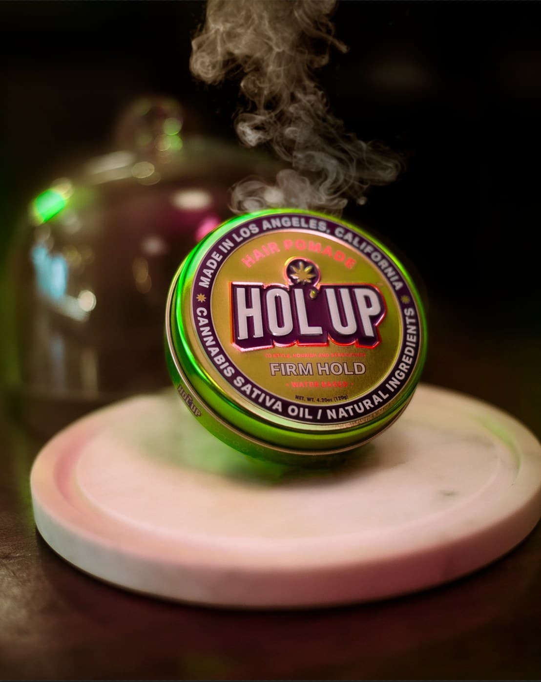 HOL'UP hair pomade tin with smoke — product photography
